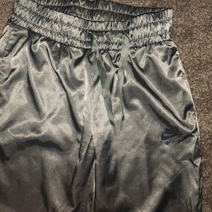 Army green satin Nike track pants